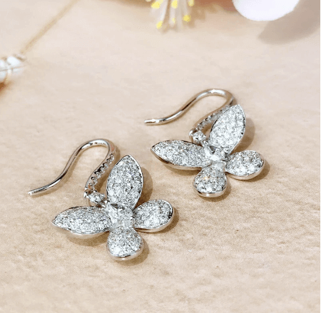 Lovely diamante, single butterfly earrings.  Combine with our Diamante Butterfly Cuff Earrings to add that extra sparkle.  Size: H1.3cm x W1.5cm