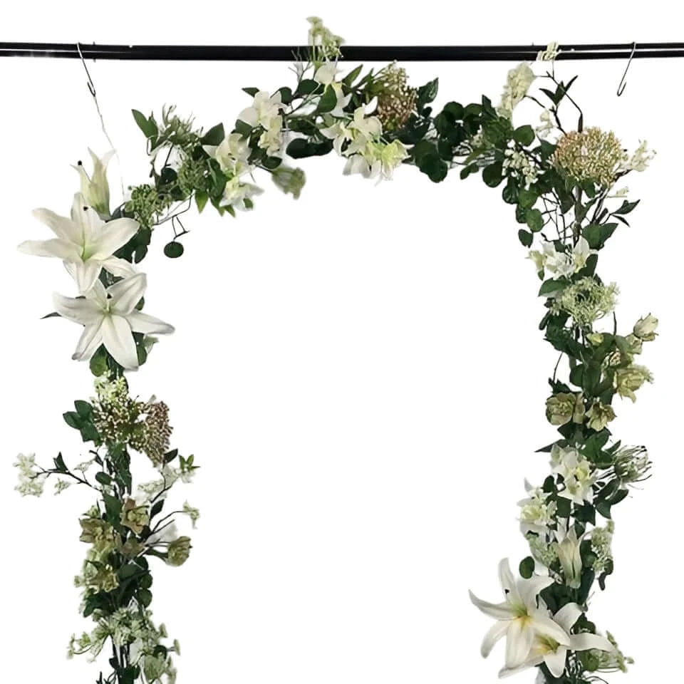 beautiful artificial white lily garland is a mix of artificial flowers of lilies, bougainvillea, hellebore, spider chrysanthemums, wild larkspur, sorbus, berries and Queen Anne lace.