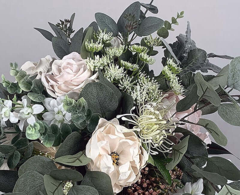 Gorgeous pink hand-crafted paper roses and peonies, accompanied by artificial flowers including Queen Anne's lace, Erica berries, spider chrysanthemums, and eucalyptus for more of a Bohemian look and feel on your special day. Atelier Blooms Auckland