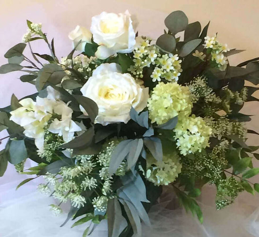 Artificial wedding bouquet (faux, silk) features a stunning arrangement of lush eucalyptus, showcasing gorgeous ivory roses, snowball hydrangeas, bougainvillea, sorbus, and wax flowers, creating a captivating display of floral elegance on your special day