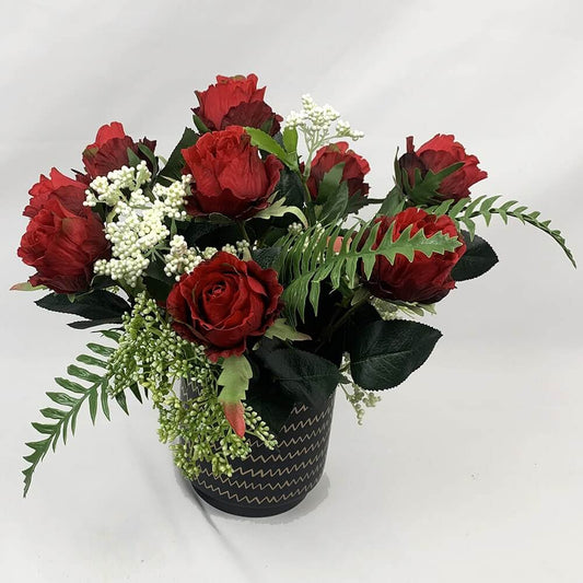 This stunning arrangement consists of artificial Francesca roses and buds, mixed with sorbus, ferns and mini berry spray in a black zig zag pot pot.  Size: H39xW35cm