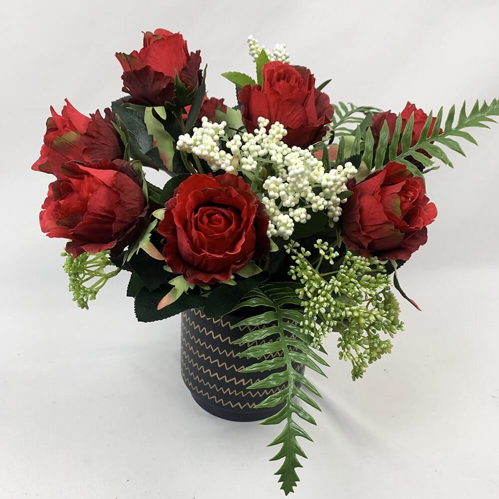 This stunning arrangement consists of artificial Francesca roses and buds, mixed with sorbus, ferns and mini berry spray in a black zig zag pot pot.  Size: H39xW35cm