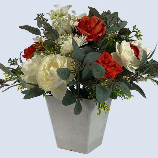 Stunning blood orange roses and gorgeous ivory peonies mixed with bougainvillea and eucalyptus in a grey stone fusion square vase.  Size: Diameter W40 x H40cm  This piece is available with other flowers or custom shades, please contact us for a custom/bespoke quote.