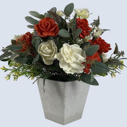 Stunning blood orange roses and gorgeous ivory peonies mixed with bougainvillea and eucalyptus in a grey stone fusion square vase.  Size: Diameter W40 x H40cm  This piece is available with other flowers or custom shades, please contact us for a custom/bespoke quote.
