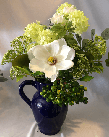 A beautiful arrangement of artificial hydrangeas mixed with artificial greenery.  Size: H61 x W41cm  This piece is available with other flowers or custom shades, please contact us for a custom/bespoke quote.  *Found Object – may not mean a new vessel/vase, but one which has been ‘found’ during our searches.  Please note: Sale price is for pictured item (Floor model) - ONE ONLY.