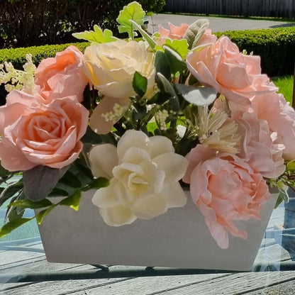 REDUCED IMAGE-Gorgeous roses, peonies and chrysanthemums with pale shades of Ivory and peach mixed with green foliage.  This stunning arrangement will add beautiful colour to your decor and bring a little spring/summer into your home or office.  This piece is available with other flowers or custom shades, please contact us  for a custom/bespoke quote.  Size:  W37 x H22 x D25cm  Please note: Sale price is for pictured item (Floor model) - ONE ONLY.  