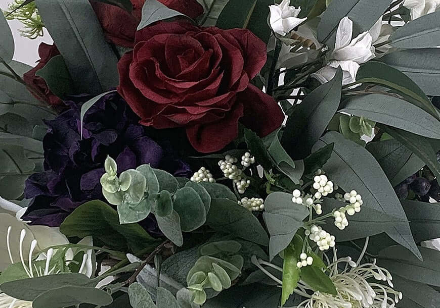 Stunning deep gem-coloured, hand-crafted paper flowers including roses, peonies, and chrysanthemums mixed with artificial florals including magnolia and spider chrysanthemums, artificial wedding flowers nz, silk flowers, Auckland