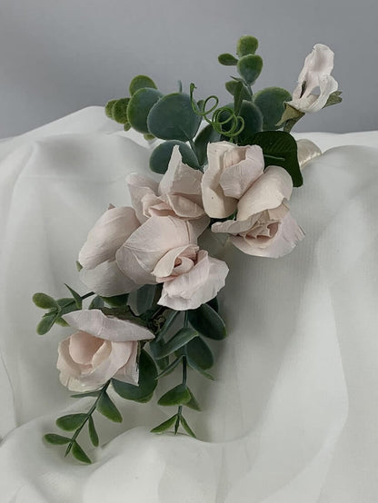 Understated satin, double bound, elegant blush headband featuring handcrafted paper sweet peas and artificial eucalyptus. This accessory can be colour matched to your theme and can be worn by both bride and bridesmaids. Atelier Blooms Auckland
