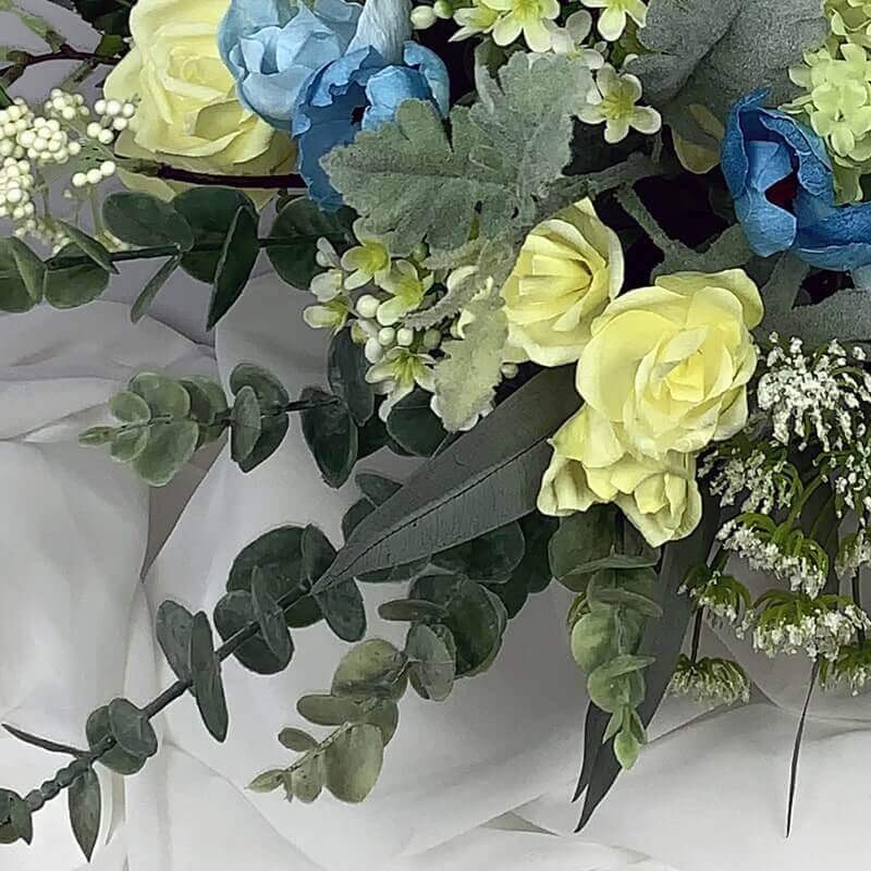 Gorgeous hand-crafted paper flowers of yellow and blue paper roses mixed with artificial flowers including snowball hydrangea, Queen Anne's lace, eucalyptus, and succulents. This beautiful bouquet will make any bride feel special. Size Bouquet: 40cm dia